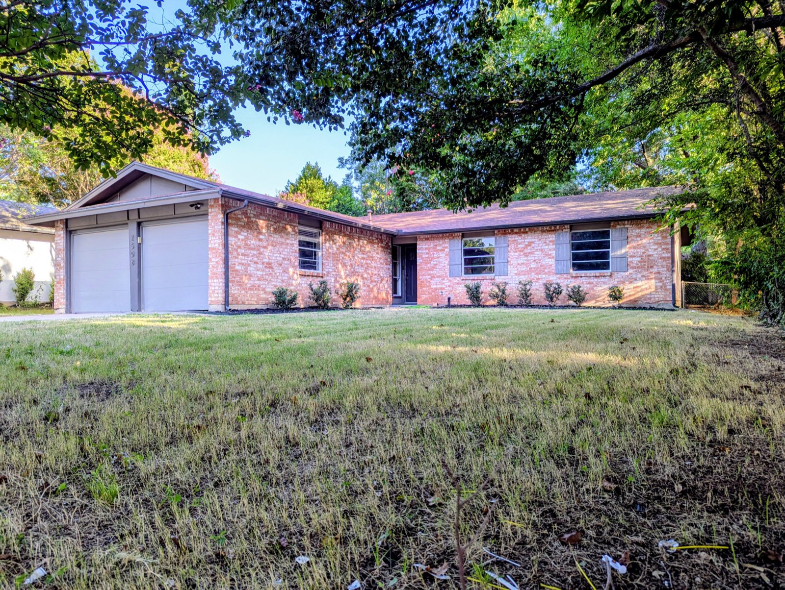 Single-story brick home with two-car garage